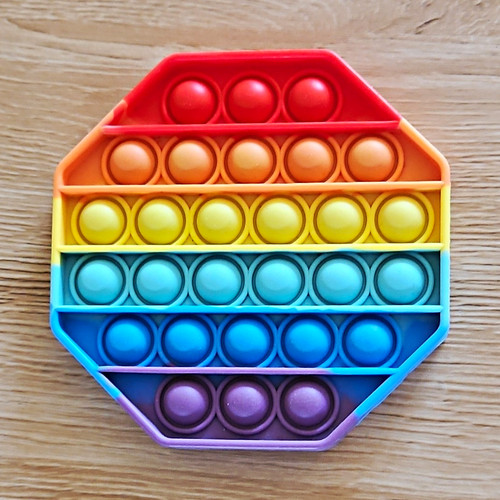 Rainbow octagon pop - it, tactile
